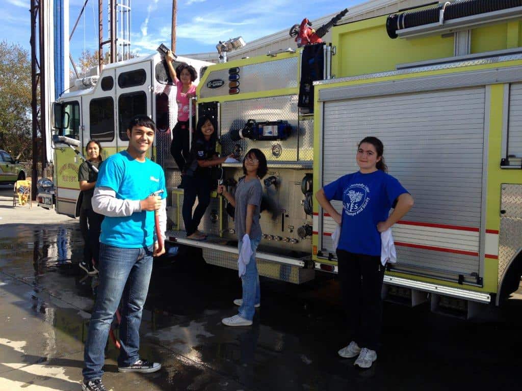 AYA students volunteering at a fire house.