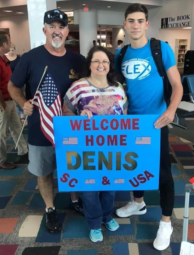 AYA host family with a welcome sign.