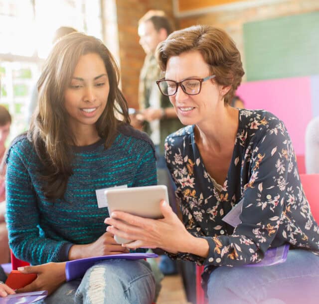 Two women having an informal chat.